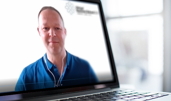 Dr Rob Waller on Laptop with blur (003)